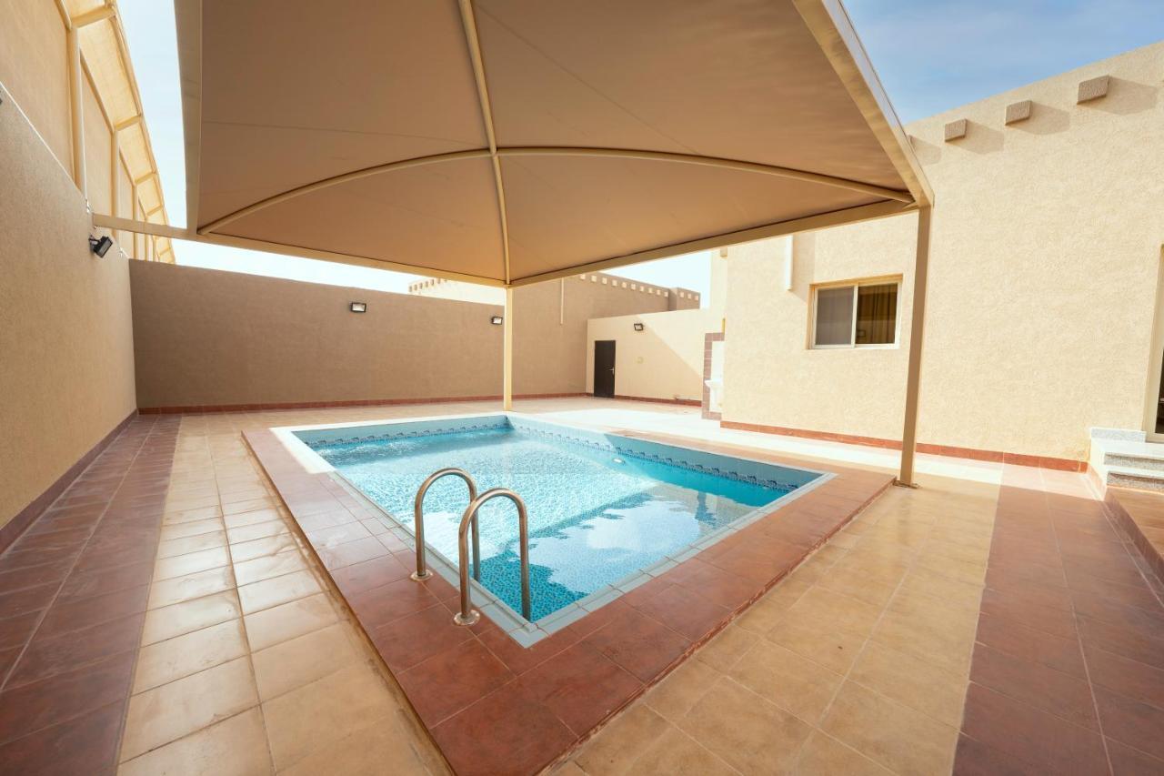 Mirada Gold Jizan - Resort & Private Pools Kültér fotó A swimming pool in Al-Shaqra, Saudi Arabia